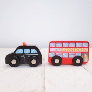 Wooden Red Bus And Black Cab